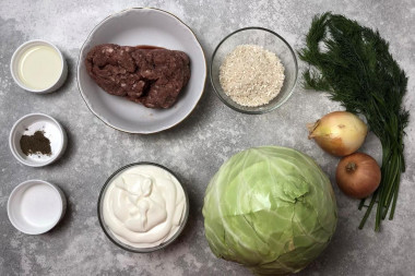 Голубцы в сметанном соусе в духовке